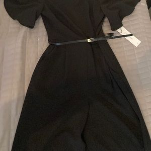 Black Calvin Klein jumpsuit with belt. Size 2, never worn.